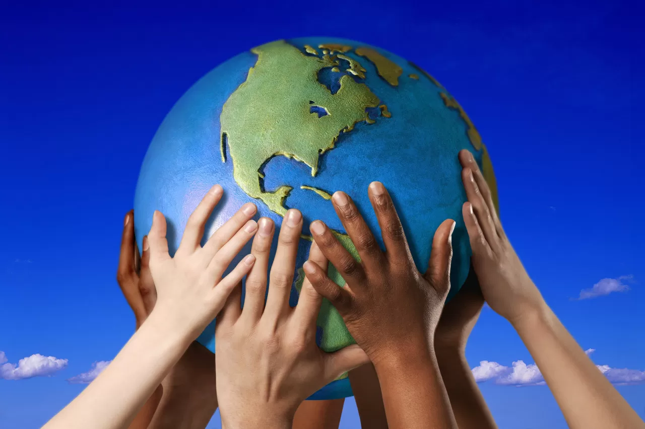 Hands on a globe