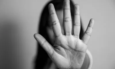 woman raised her hand for dissuade