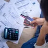 Business people are stressed about credit card debt and many bil